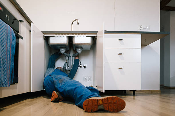 Professional Emergency Plumber technician working in Washburn, ND